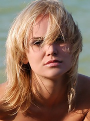 Zemani.com Ksyuha - Nice blond taking off her jeans and shows her body on the seaside.
